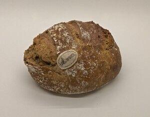 Ein mitteldunkles, knuspriges Brot mit gleichmässigen, saftigen Poren. Gebacken mit UrDinkelmehl vom Stockengut in Kilchberg.